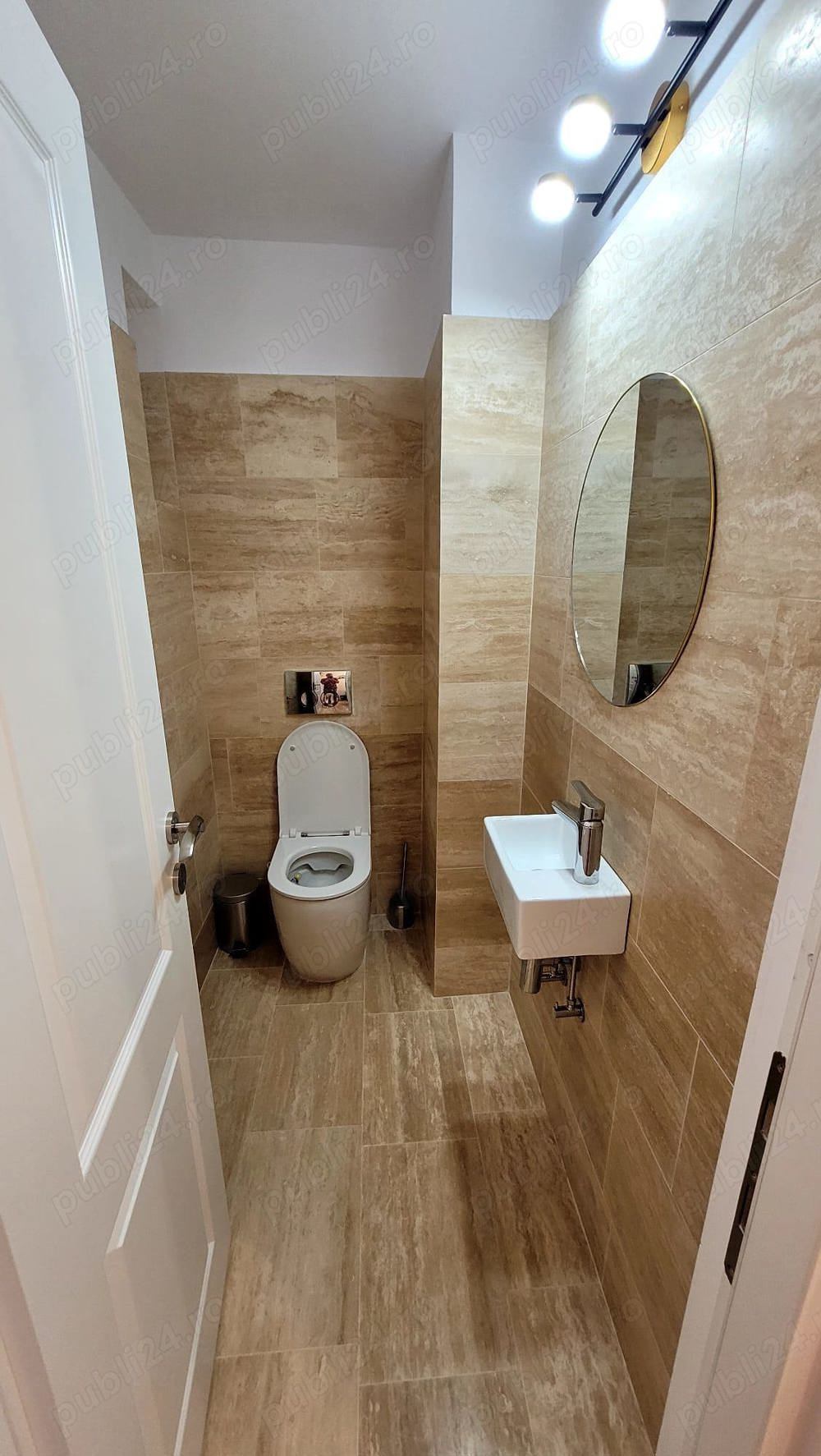 A small bathroom with a toilet and a sink